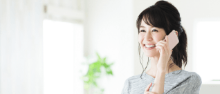 電話中　女性　写真