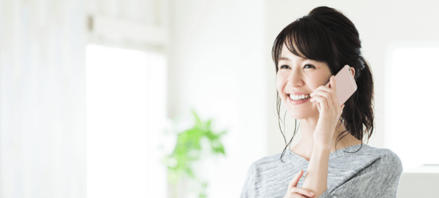 電話中　女性　写真